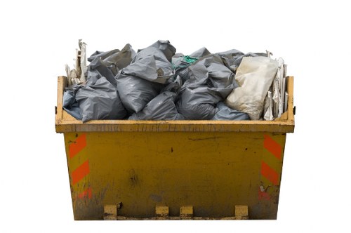 Various types of construction debris sorted for disposal