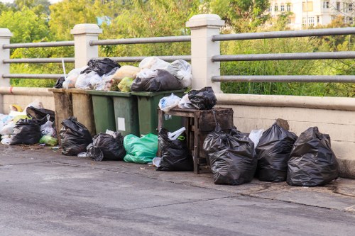 Heavy machinery involved in builders waste clearance