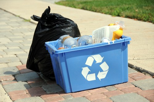Professional waste management workers handling commercial waste